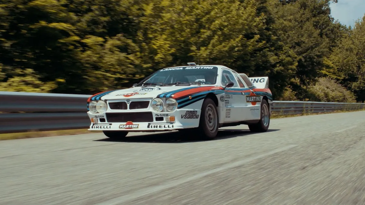 Lancia Rally 037 in Martini livery on a mountain road